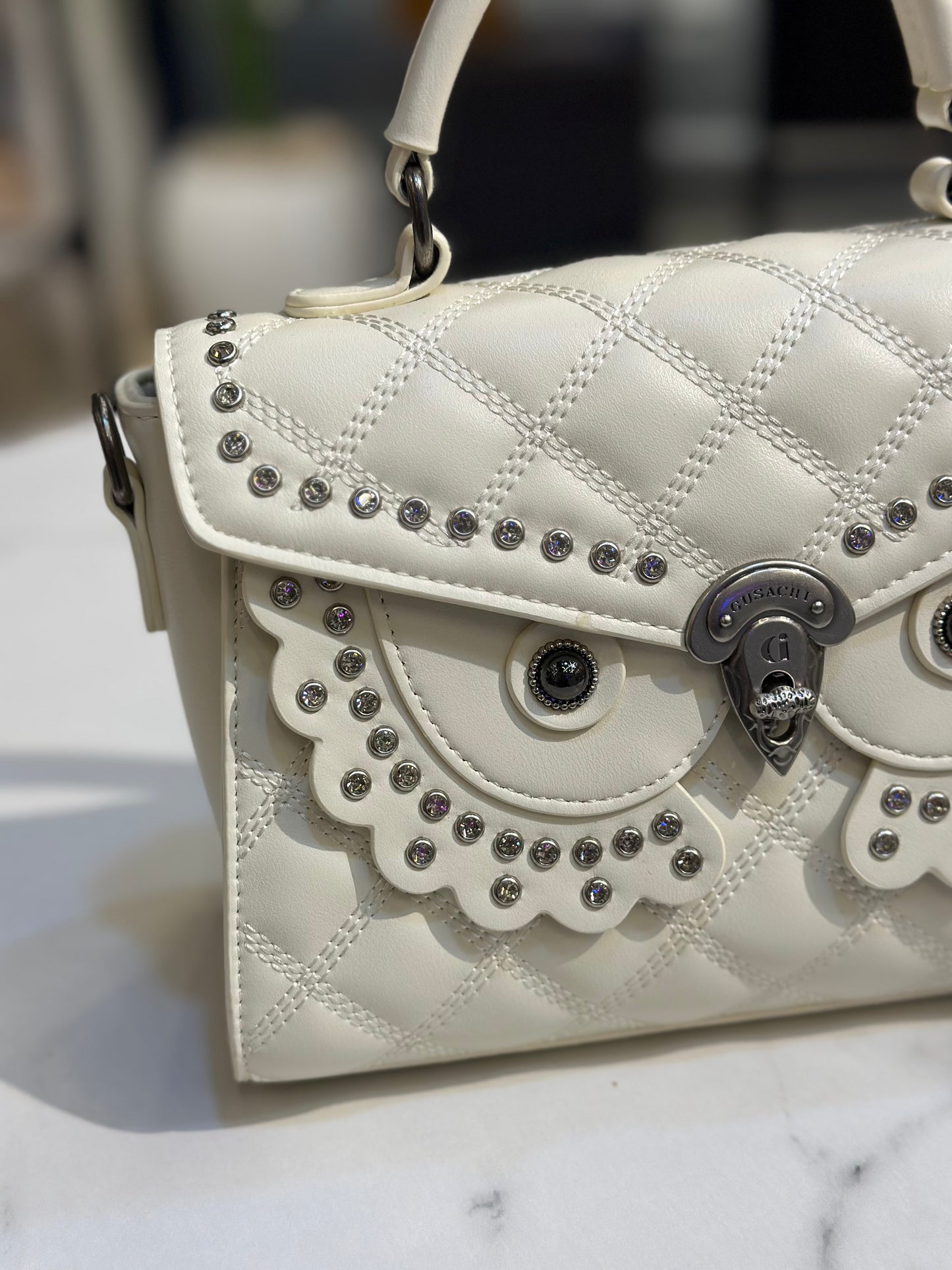 Signature Quilted Statement Bag